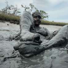 Messy Temptress: Messy Temptress Gives a Filthy Footjob in the Mud!