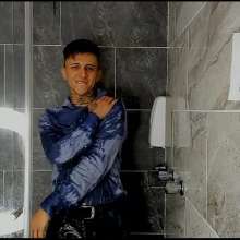 WETColours: Nico in the Shower in a Blue Shirt and Jeans