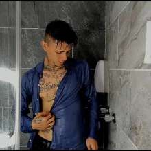 WETColours: Nico in the Shower in a Blue Shirt and Jeans