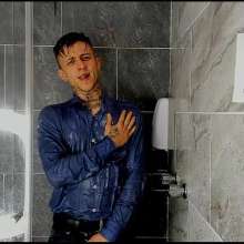 WETColours: Nico in the Shower in a Blue Shirt and Jeans