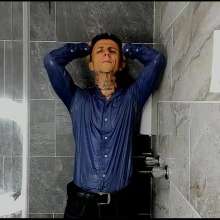 WETColours: Nico in the Shower in a Blue Shirt and Jeans