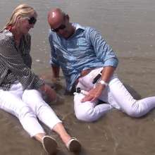 custardcouple: Wet Clothed Couple In Sea