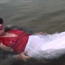 custardcouple: Wet Clothed Couple In Sea
