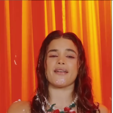 poolguy: Hot Latina Instagram model getting messy wearing red latex in music video