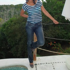 Aqua: Alejandra soaks her jeans, a striped t-shirt and her pumps in a pool