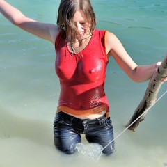ufa217: Elena in jeans shows a striptease in the lake.