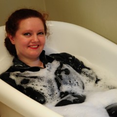 DungeonMasterOne: A nice relaxing bubblebath in a black rubber catsuit for Cynthia!