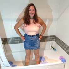 CandyCustard: MyPierogative gunged in pink top, denim skirt and nude tights