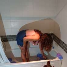 CandyCustard: MyPierogative gunged in pink top, denim skirt and nude tights