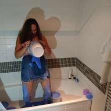 CandyCustard: MyPierogative gunged in pink top, denim skirt and nude tights