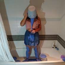 CandyCustard: MyPierogative gunged in pink top, denim skirt and nude tights