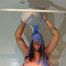 CandyCustard: MyPierogative gunged in pink top, denim skirt and nude tights