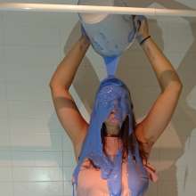 CandyCustard: MyPierogative gunged in pink top, denim skirt and nude tights