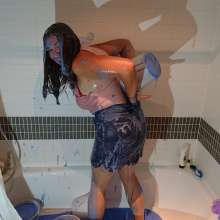 CandyCustard: MyPierogative gunged in pink top, denim skirt and nude tights