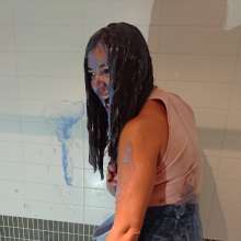 CandyCustard: MyPierogative gunged in pink top, denim skirt and nude tights