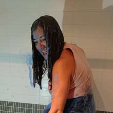 CandyCustard: MyPierogative gunged in pink top, denim skirt and nude tights