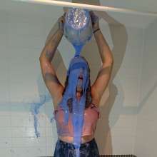 CandyCustard: MyPierogative gunged in pink top, denim skirt and nude tights