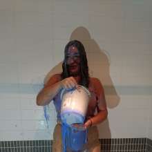CandyCustard: MyPierogative gunged in pink top, denim skirt and nude tights