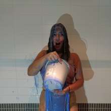 CandyCustard: MyPierogative gunged in pink top, denim skirt and nude tights