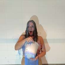 CandyCustard: MyPierogative gunged in pink top, denim skirt and nude tights