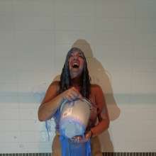 CandyCustard: MyPierogative gunged in pink top, denim skirt and nude tights