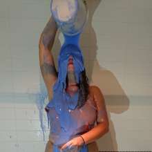 CandyCustard: MyPierogative gunged in pink top, denim skirt and nude tights