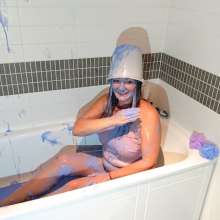 CandyCustard: MyPierogative gunged in pink top, denim skirt and nude tights