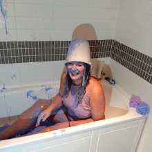 CandyCustard: MyPierogative gunged in pink top, denim skirt and nude tights