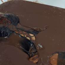 MostWam: Lila's PVC String Outfit in Chocolate Bath