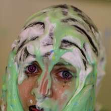messyhot: Honey Heptane--goth gunged in fishnet
