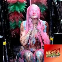 LiquidX: Messyworld gets new host, and she's fearless.