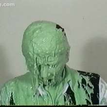 Anglefan: Green slimed in business attire