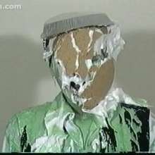 Anglefan: Green slimed in business attire