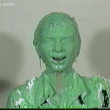 Anglefan: Green slimed in business attire