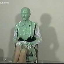 Anglefan: Green slimed in business attire