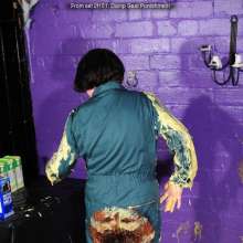 DungeonMasterOne: Evelyne the cook covers her green boilersuit in custard!