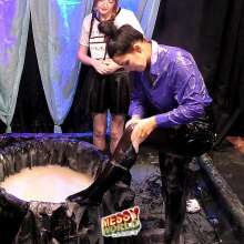 LiquidX: Issy gets stuck in large tub of 'Glue' in officewear and tights
