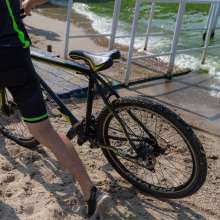 Wet Live Team: Ruslan in a Cyclist Costume Got Completely Wet on the Beach