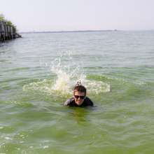 Wet Live Team: Ruslan in a Cyclist Costume Got Completely Wet on the Beach