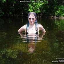 DungeonMasterOne: Lady Jennifer goes into the river for a swim in Hugo Boss jeans