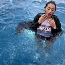wet.look.me: Wetlook girl in coat and shorts gets wet in mountains pool | Wetlook.biz