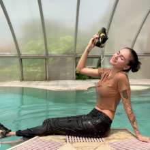 Get Your Snaps: Olga gets wet at home in in the pool