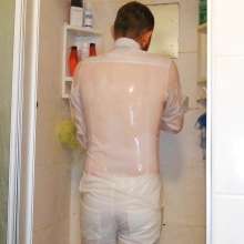 Thefetishgirl: Hotstuff Is at If Again with a Steaming Hot Wet Look Shower