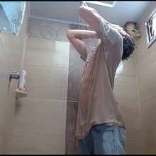 WETColours: Dario in His First Shower with T-shirt and Jeans