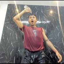 WETColours: Jack Super Wet in Red T-shirt and Black Shorts