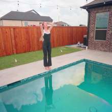 WetlookFashion: Kate Dives in the Pool Wearing a Black and Shiny Jumpsuit