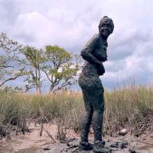 Messy Temptress: Muddy Fun in Converse and Fishnets