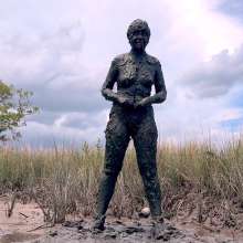 Messy Temptress: Muddy Fun in Converse and Fishnets
