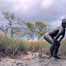 Messy Temptress: Muddy Fun in Converse and Fishnets