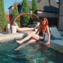 WetlookFashion: Riah Is Going for a Swim and a Shower in Faux Leather